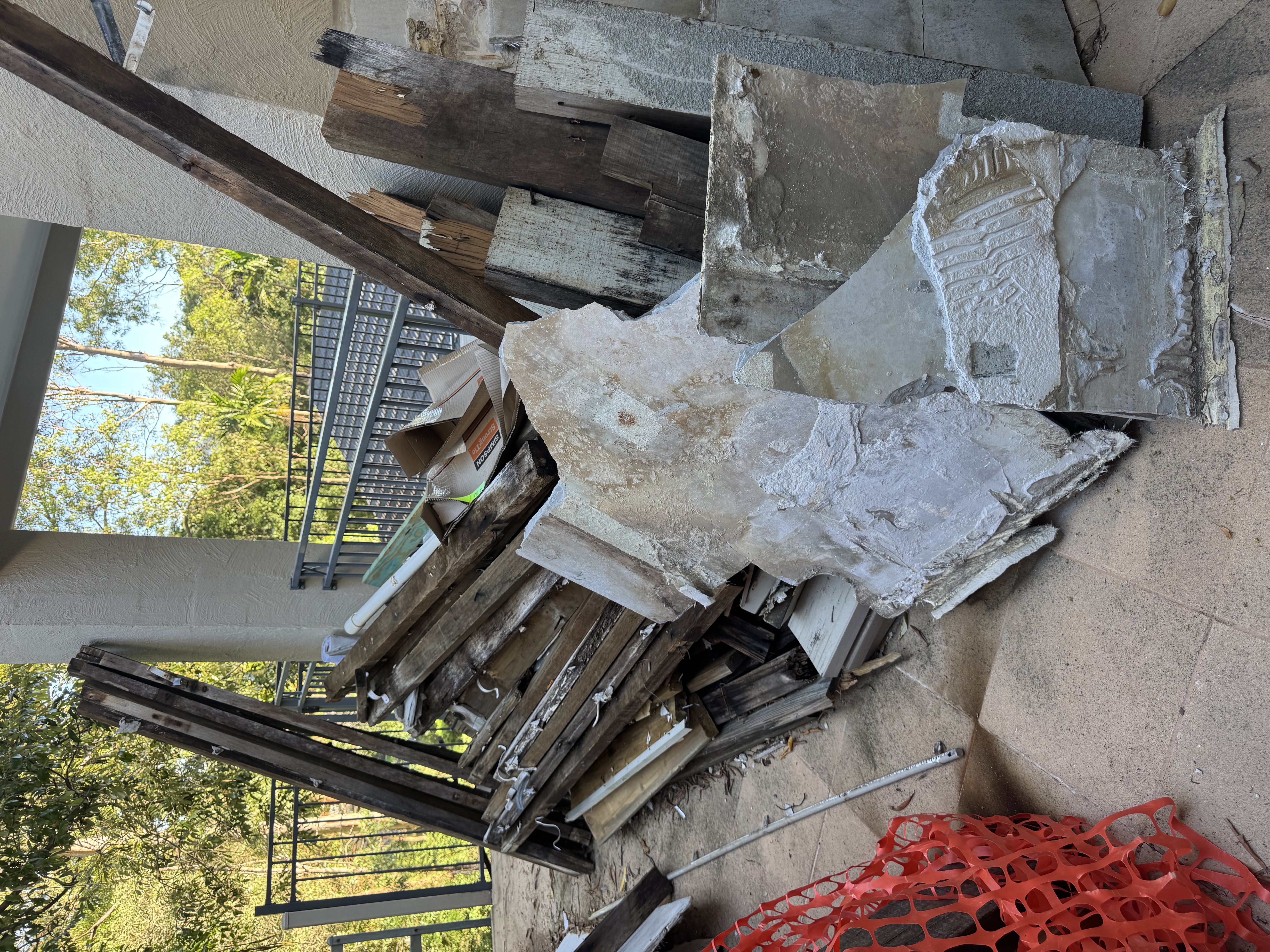 Construction waste including timber and concrete for disposal